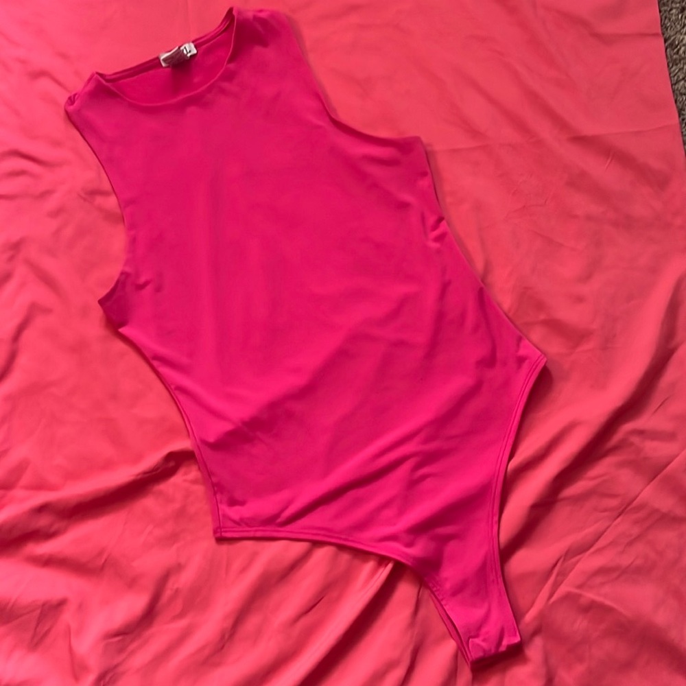 Pink body suit